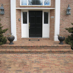 Herringbone brick porch and bullnose steps BEFORE Square